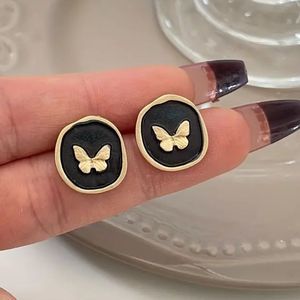 🖤Black and GoldTone Antique Style Butterfly post back Earrings🖤